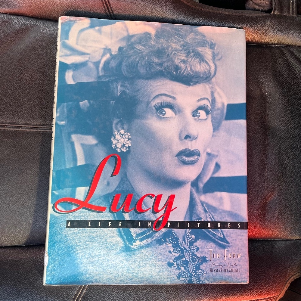 Lucy: A Life in Pictures - Blue and Red Cover